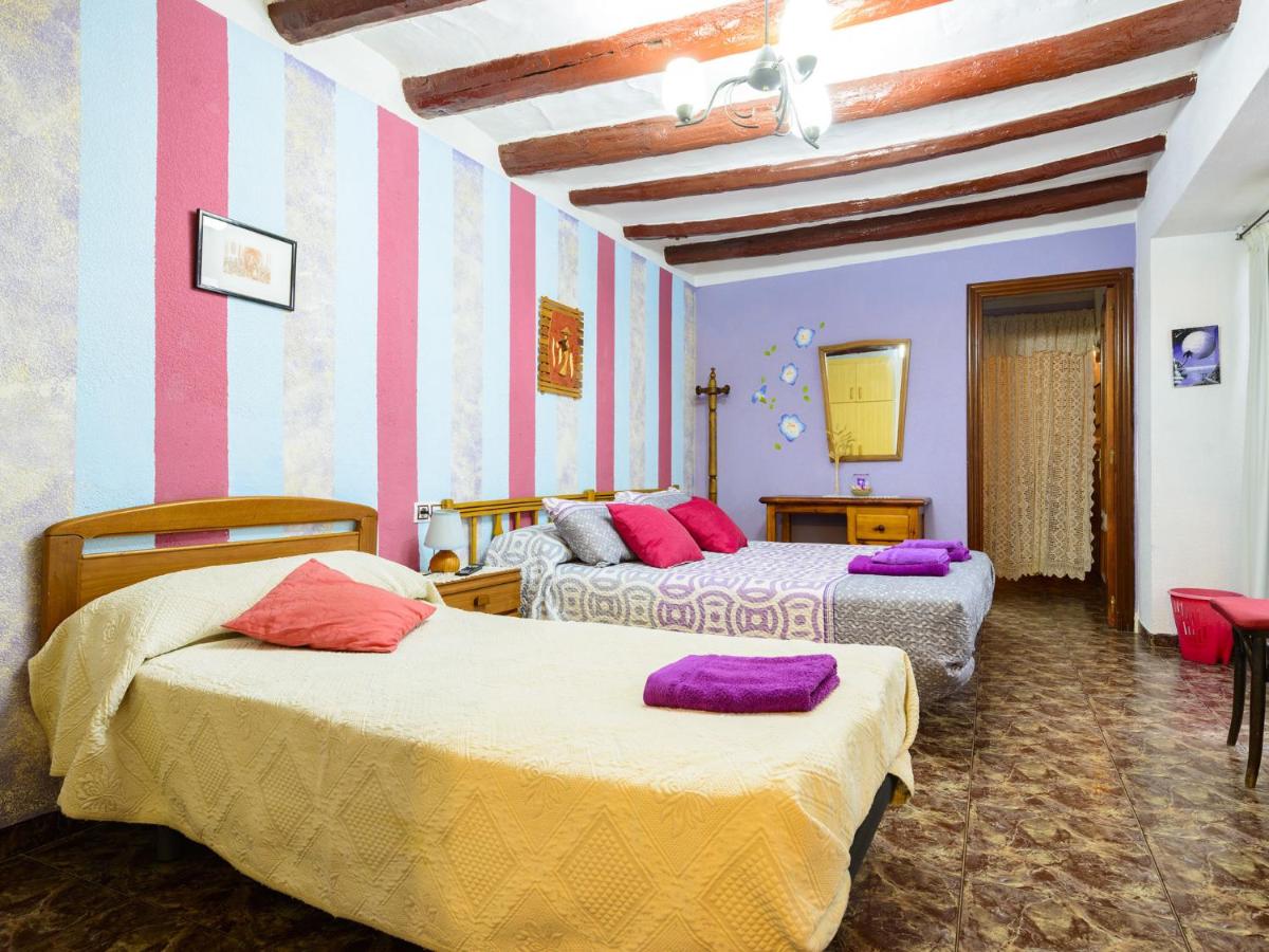 Habitación doble con camas en azul