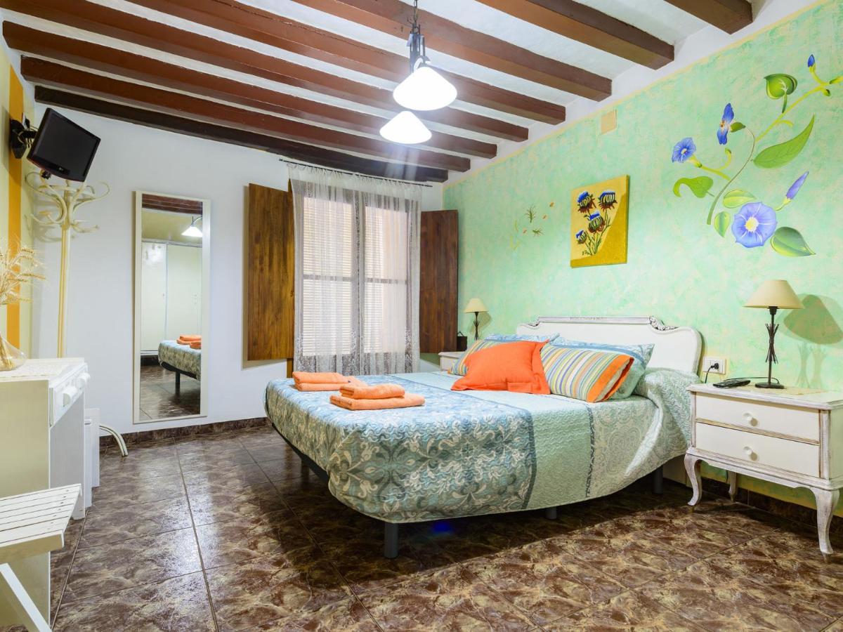 Habitación matrimonio con decoración floral